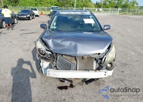 2009 Pontiac Vibe из США, поврежденный, VIN 5Y2SP670X9Z468940